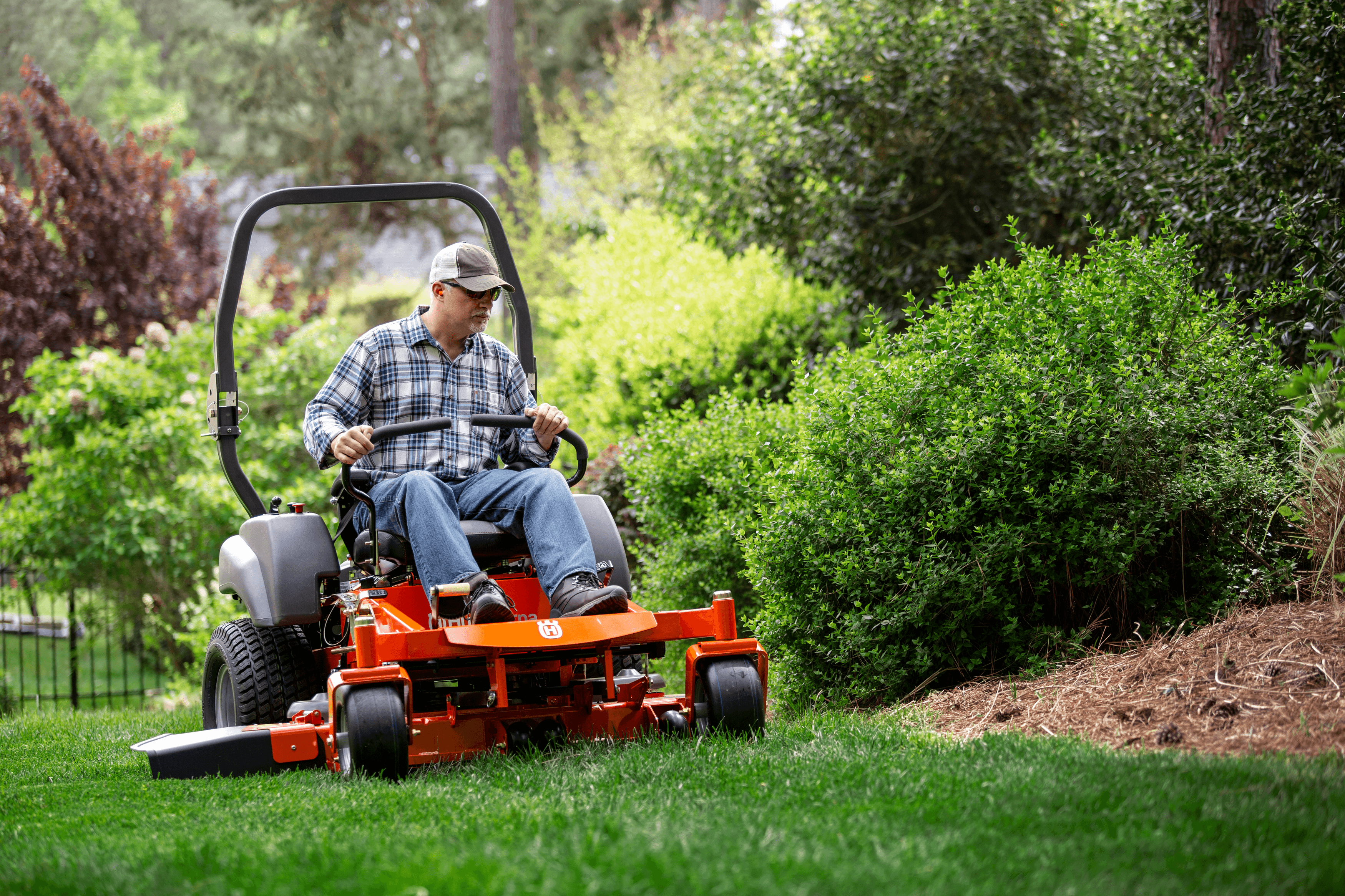 man wearing ppe with chainsaw